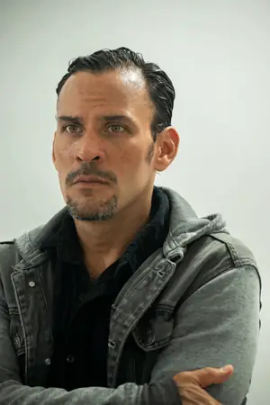 Retrato de hombre con chaqueta verde